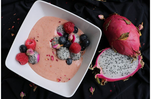 breakfast smoothie bowl with berries and dragonfruit