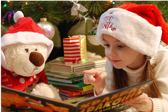 child reading holiday themed book