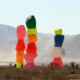 neon rock totems in desert southwest