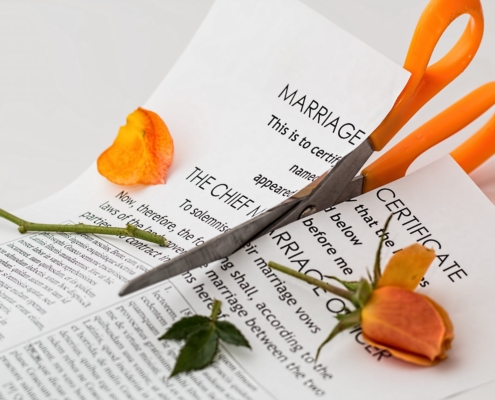 divorce scissors cutting paperwork