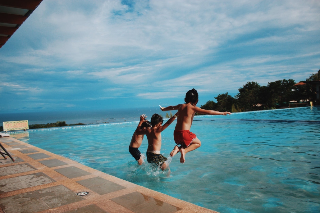 kids jumping into pool header image