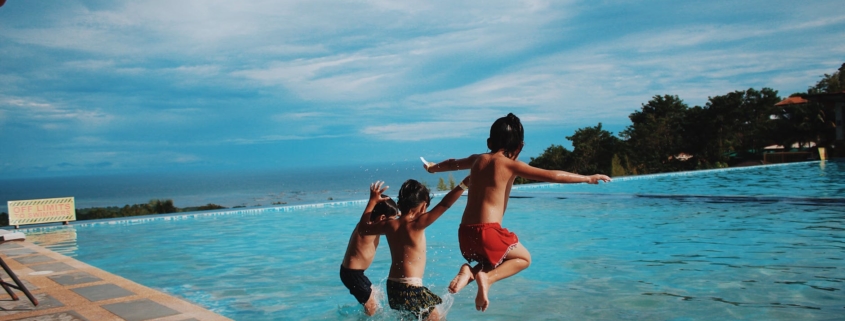 kids jumping into pool header image